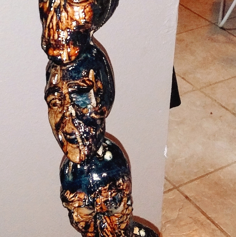 Hand carved walking stick a wizard with a stack of